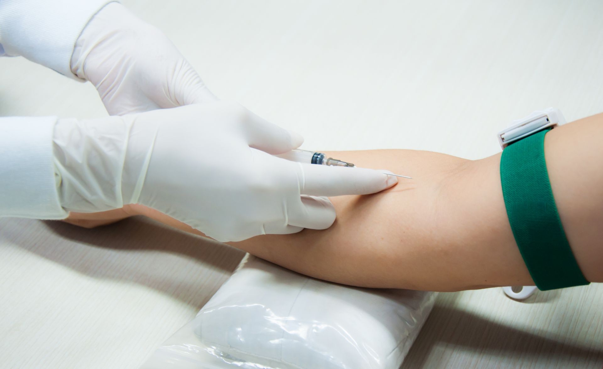 Medical technologist doing a blood draw examination in laboratory room. hospital